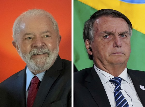 Lula supera Bolsonaro em 8 pontos percentuais em pesquisa eleitoral [Foto: AP Photos]